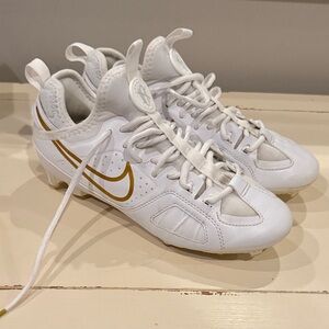 Nike White and Gold Athletic Cleats